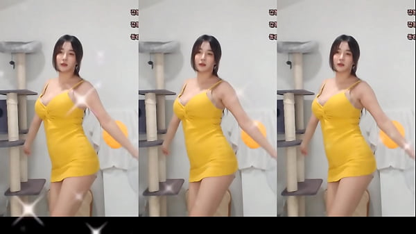 Sexy thick Korean babe dancing in yellow dress