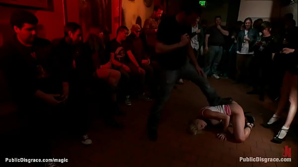 Blonde with wired butt plug in public