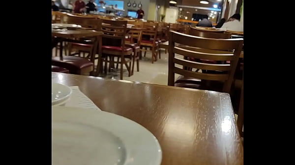 Showing her breasts in the restaurant