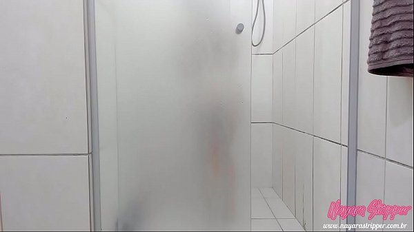 blonde Nayara taking a shower