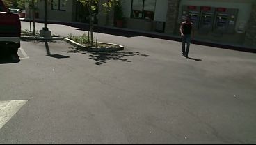 A very sexy brunette milf with small boobs and an amazing body is having sex on the table