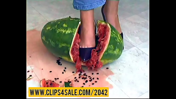 Watermelon crushing under high heels