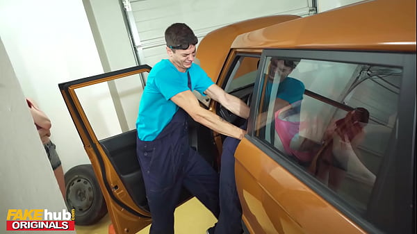 Redhead girls get down and dirty at the garage with young mechanic