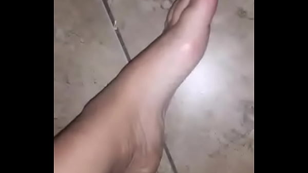 Record her feet while hiding in the bathroom before touching