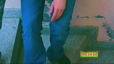 Pissing in public on the school stairs in the daytime