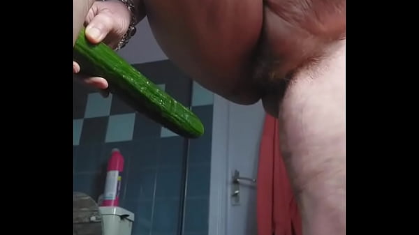 Granny fucks hairy pussy with cucumber