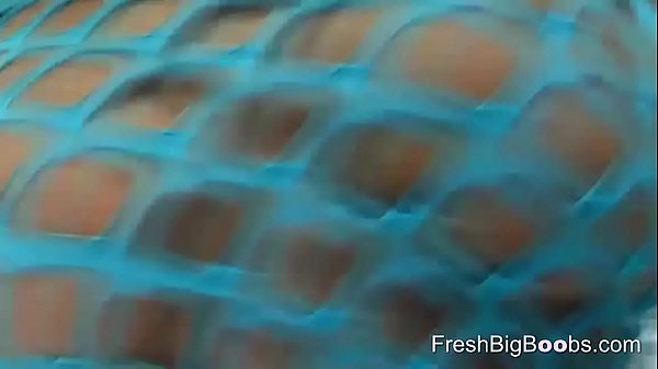 Fishnet babe reveals her boobs