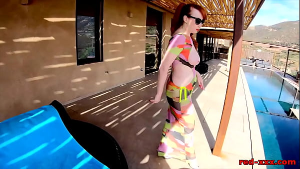 Redhead MILF Red XXX masturbating outside by the pool