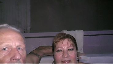 Trashy Kiwi MILF pisses in the spa pool. Very proud of herself