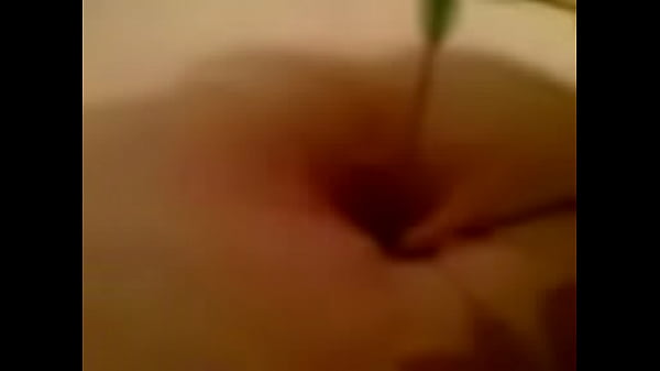 Girl playing with her belly button (2006