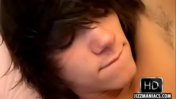 A hot brunette twink is giving erotic head on a...