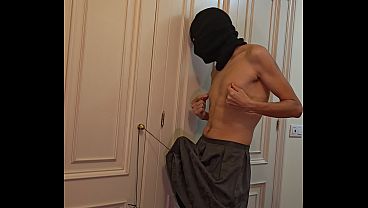 Weight hanging from cute slave's balls