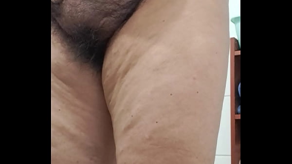 The milf's pussy is fat and very hairy