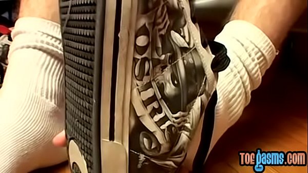 Thug jock Evan Heinze caressing socks in foot f...