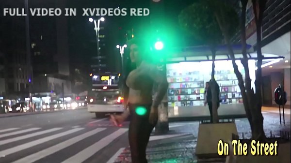 She showed her breasts and stood almost naked in the street full of people. ( Full video in xvideos red )