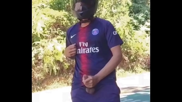 Biker Football player uniform jerking off out i...