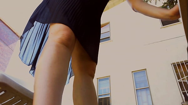 Sexy legs smeared with cream in public garden 4K