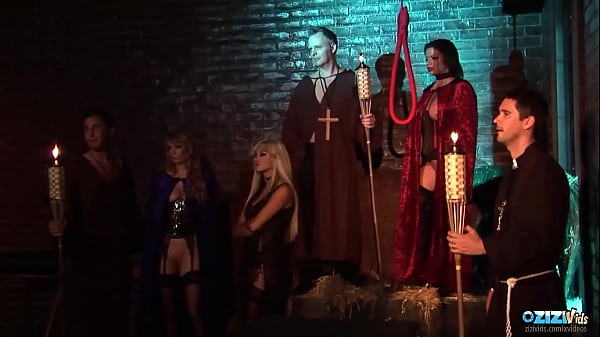 Deep within the dark dungeon the busty blonde and brunette milfs are having group sex