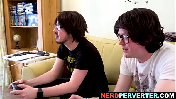 Blonde beauty enjoys sucking two hard cocks