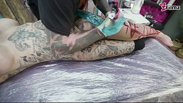 Superb Tattoo Babe Gets a New Tattoo while Having a Big Dick in her Asshole - Gaping and ATM