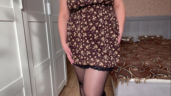 Beauty in sexy pantyhose poses and caresses her holes to orgasm