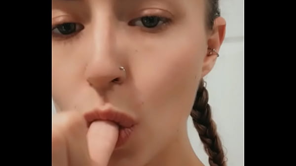 Petite naughty blonde sucks fingers and looks at cam