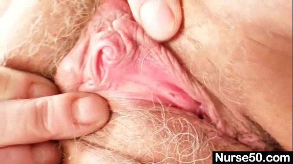Grandma in uniform spreads blond hairy pussy