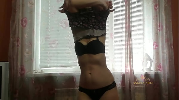 Horny MILF dances a striptease at the window while waiting for her young husband from work to be fucked / Angela-MILF