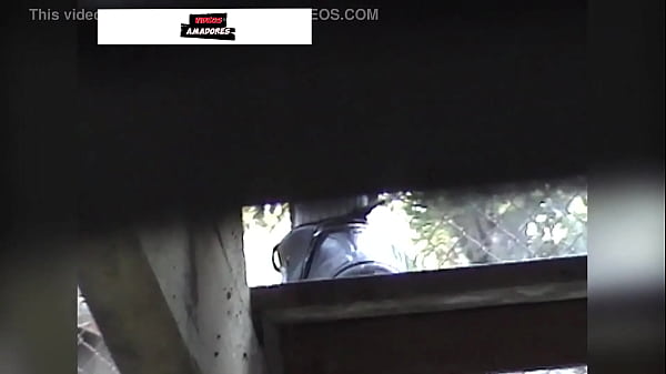 Voyeur films hot brunette panties under the stairs