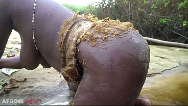 Busty African village wife making medecins outdoor in the forrest