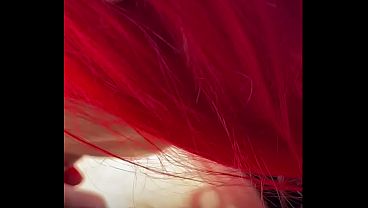 Redhead deepthroats thick BBC in the car, fingers gripping tight