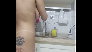Washing the dishes and ring my dinner