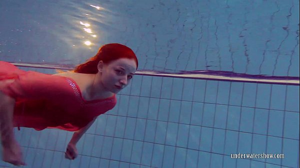 Redhead in the pool