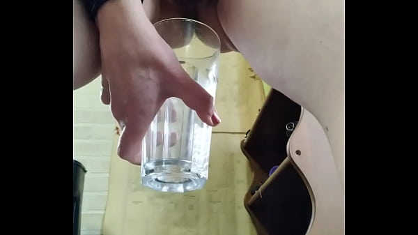 Amateur milf pees in glass