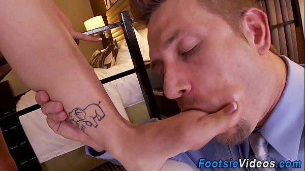 Pretty slut gives footjob