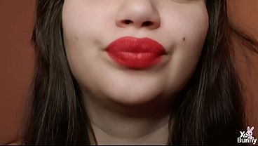Big lips with red lipstick smoking