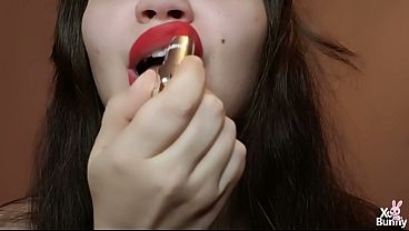 Big lips with red lipstick smoking
