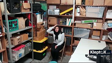 Hijab thief bends over desk so security won't call cops