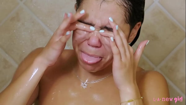 Super cute brunette teen enjoys hot shower