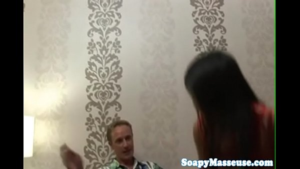 Cute asian masseuse tugging clients dick