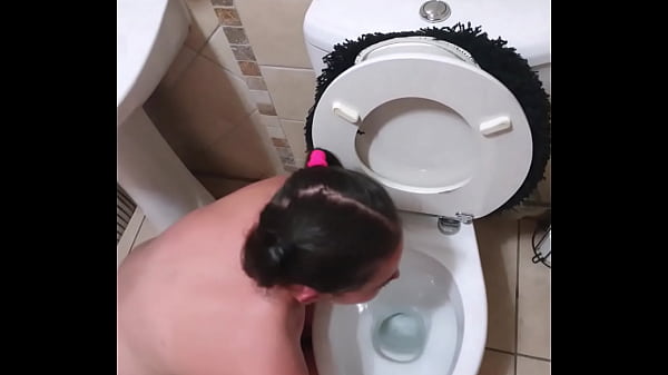 Pigtailed teen sucks dick after being pissed on and licking the toilet clean | face spitting and slapping