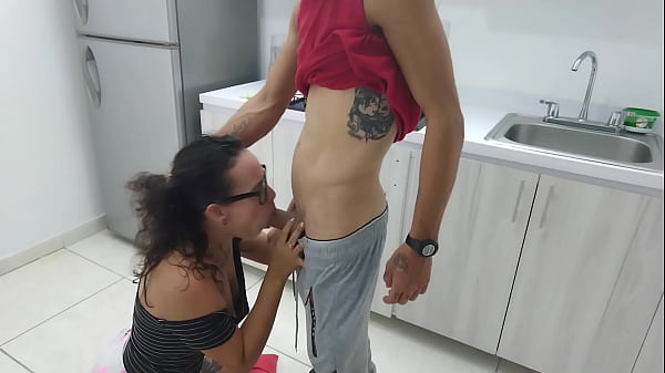My stepsister gives me oral sex in the kitchen
