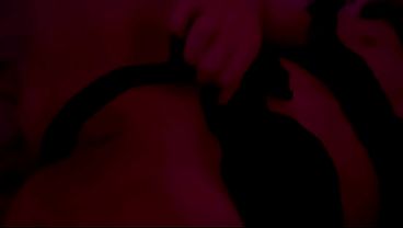 Real Couple Intimate Moment Under Red Lights
