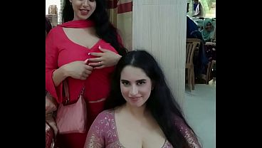 Two girls undressing