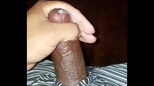 Playing with black chocolate dick