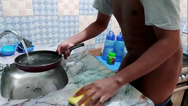 Young Naked Slut Washing Dishes