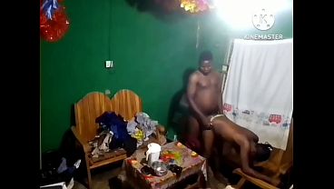 She gives a visitor a doggy-style blowjob
