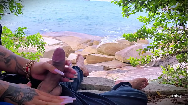 Handjob surprise ejaculation on the beach