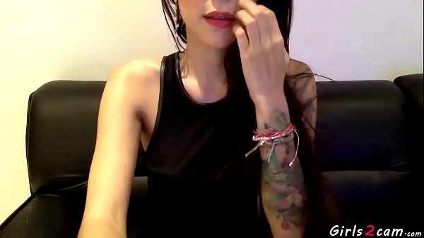 Tattooed girl shows her pussy