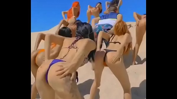 gostosas dançando na praia